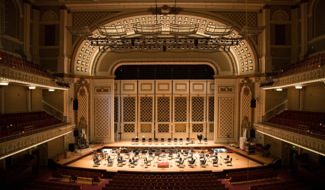 Cincinnati Music Hall is Full of Ghosts
The next time you’re enjoying a performance by the Cincinnati Ballet or Pops Orchestra, wave hello to the ghosts. Just do it. Because according to multiple Music Hall employees over the years, they’re there. The historic Music Hall was built in 1878, partially over a public burial ground. On more than one occasion, workers have discovered human bones during renovations. In most cases, the remains were respectfully re-interred at Spring Grove Cemetery. But the ghosts of those remains? They seem to stick around. Rumors supported by everyone from the late Pops Music Director Erich Kunzel to the Cincinnati Opera CEO and General Director Patricia Beggs suggest that the ghosts of Music Hall are alive(ish) and well.