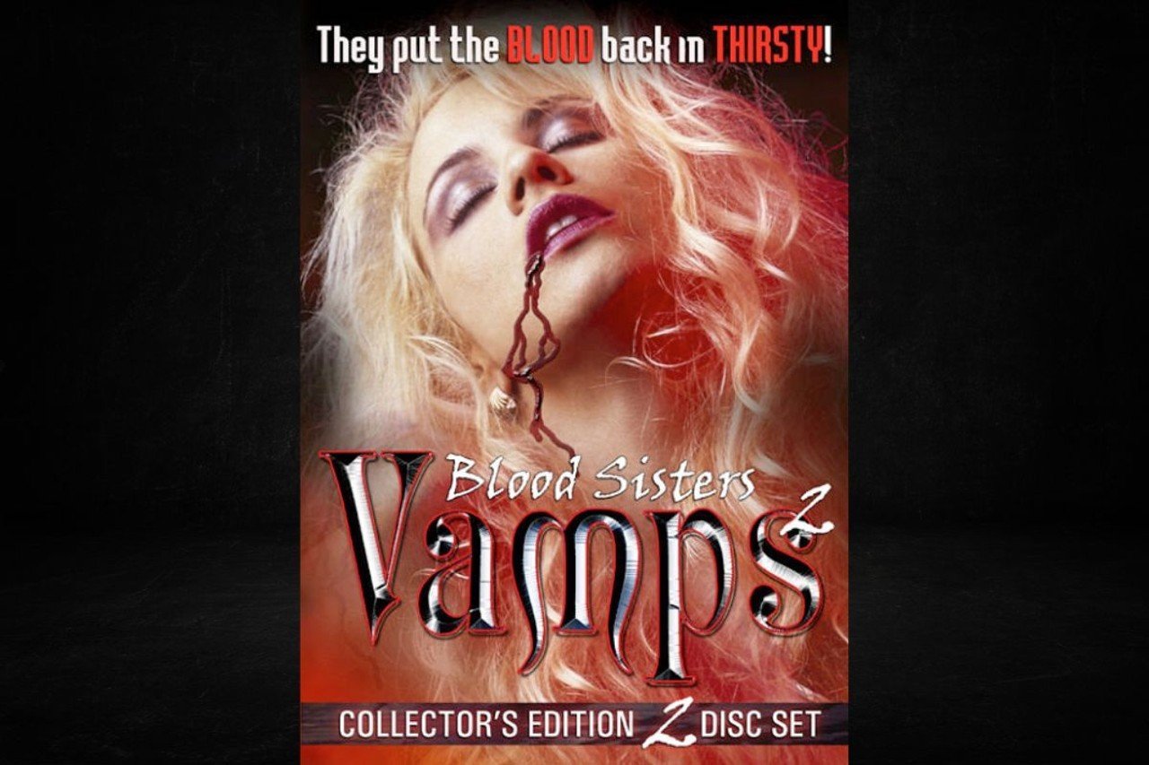 Blood Sisters: Vamps 2 (2002)
In a straight-to-video sequel of Mark Burchett’s Vamps, Blood Sisters: Vamps 2 takes up back to the vampire strip club where Heather, who became a vampire after all (and is now played by Glori-Anne Gilbert), still works as an exotic dancer while her fiancé, the now-defrocked Seamus, manages the club. They learn they’ve made an enemy of another vampire, Elizabeth (Amber Newman), whose sister was killed by the denizens of Vamps years earlier. Elizabeth also wants the vampire strippers dead because Seamus and Heather could be the key to bringing about the Prophecy of the Redeemer, which would put an end to vampires entirely.