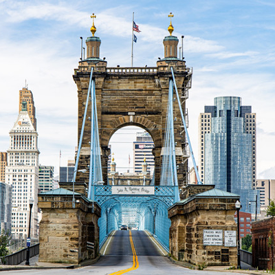 Telling People the Roebling was the Brooklyn Bridge’s PredecessorAt first glance it might appear the Roebling Bridge is just a smaller-scale model of the massive Brooklyn Bridge, but that’s not the case. The Roebling, which connects downtown Cincinnati to Covington, is actually the older (and, in our opinion, cooler) sibling to the Brooklyn Bridge, both having been designed and built by John A. Roebling. Construction on the Roebling was completed in 1866 and, at the time, it was the longest suspension bridge in the world. Construction on the Brooklyn Bridge wasn’t completed until 1883.