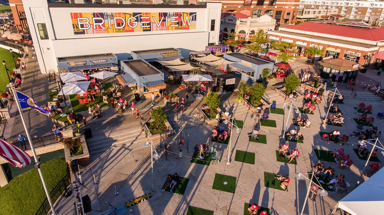 Bridgeview Box Park
1 Levee Way, Newport
Bridgeview Box Park, a cluster of small food, drink and shopping vendors, is open year-round, but the best time to visit is when the weather is nice. The establishments are housed next to each other in shipping-like containers — hence “box park” — and are interspersed among a common outdoor area. The breezy space overlooks the Ohio River and city and features turf lounge areas, string lights and outdoor games like corn hole and giant Jenga.