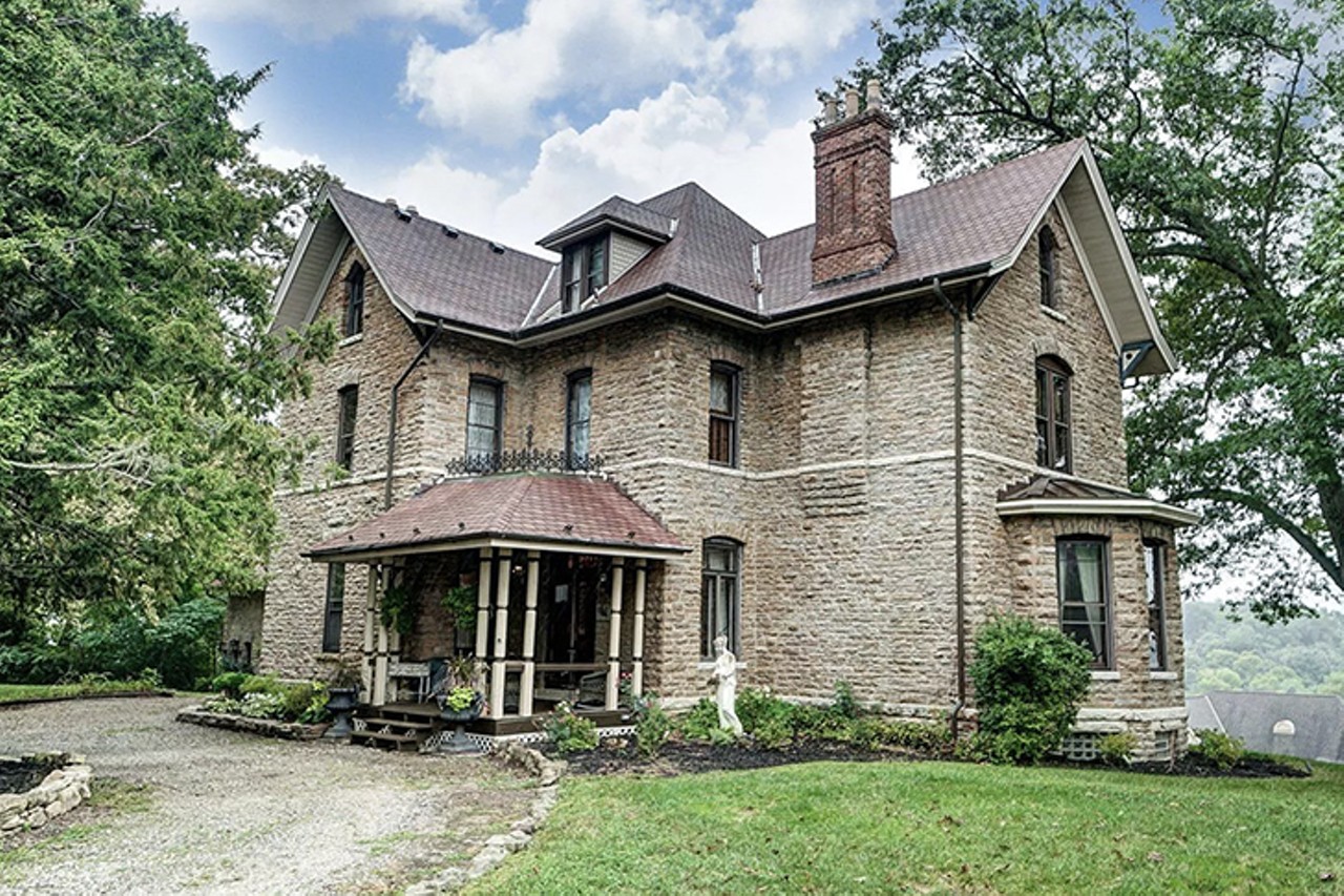 The founder of the American Forestry Association lived in North Bend and studied horticulture in his backyard
10 Muirfield Drive in North Bend, also known as the Aston Oaks English Manor (pictured above), is an impressive home, but did you know that it was also the site of the Midwest’s first fruit experiment station and the country's first forestry station? Dr. John Aston Warder, a doctor turned horticulturist, bought the land the home now sits on from former First Lady Anna Harrison, William Henry Harrison’s widow (yes, the same president who died after a month in office because he didn’t wear a coat to his inauguration). After Warder took over, the property eventually featured acres of fruit orchards, ornamental trees and shrubs that Warder used to fuel his research. All this work led to him founding the American Forestry Association, now just known as American Forests, an organization that advocates for careful and science-backed strategies for forest conservation.