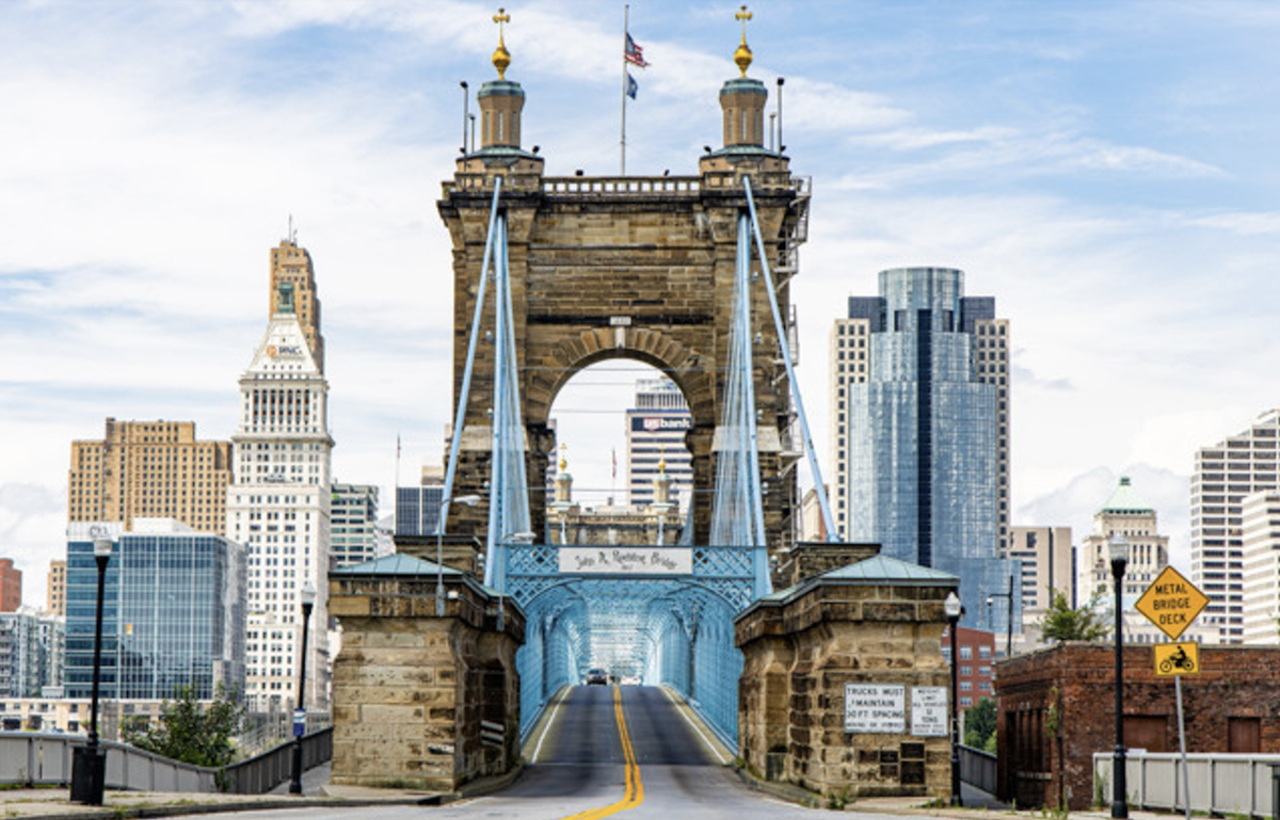 When it was first built, the Roebling Bridge was the longest suspension bridge in the world
At first glance it might appear the Roebling Bridge is just a smaller-scale model of the massive Brooklyn Bridge, but that’s not the case. The Roebling, which connects downtown Cincinnati to Covington, is actually the older (and, in our opinion, cooler) sibling to the Brooklyn Bridge, both having been designed and built by John A. Roebling. Construction on the Roebling was completed in 1866 and, at the time, it was the longest suspension bridge in the world. Construction on the Brooklyn Bridge wasn’t completed until 1883.