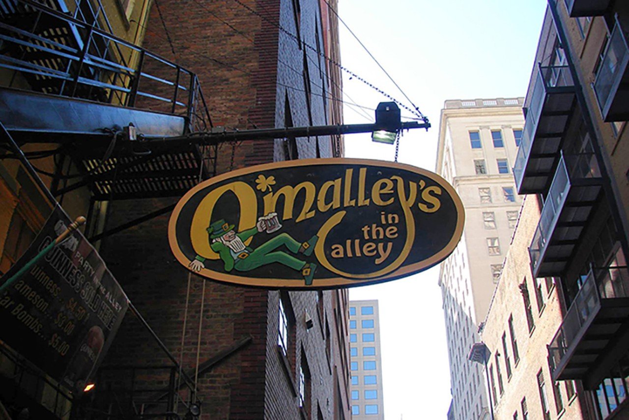 O’Malley’s in the Alley
25 W. Ogden Place, Downtown
Opened in 1892, O’Malley’s in the Alley bills itself as the second-oldest bar in Cincinnati, making it the only bar on this list to be around for and survive Prohibition. The pub offers a straightforward imbibing experience, drink specials and homemade dishes that have stood the test of time, like its beer-battered fish sandwich, fish and chips or wings. You’ll find the entrance in a shady alleyway along Ogden Place, not too far of a walk from Great American Ball Park, making it a must-stop spot before or after a game.