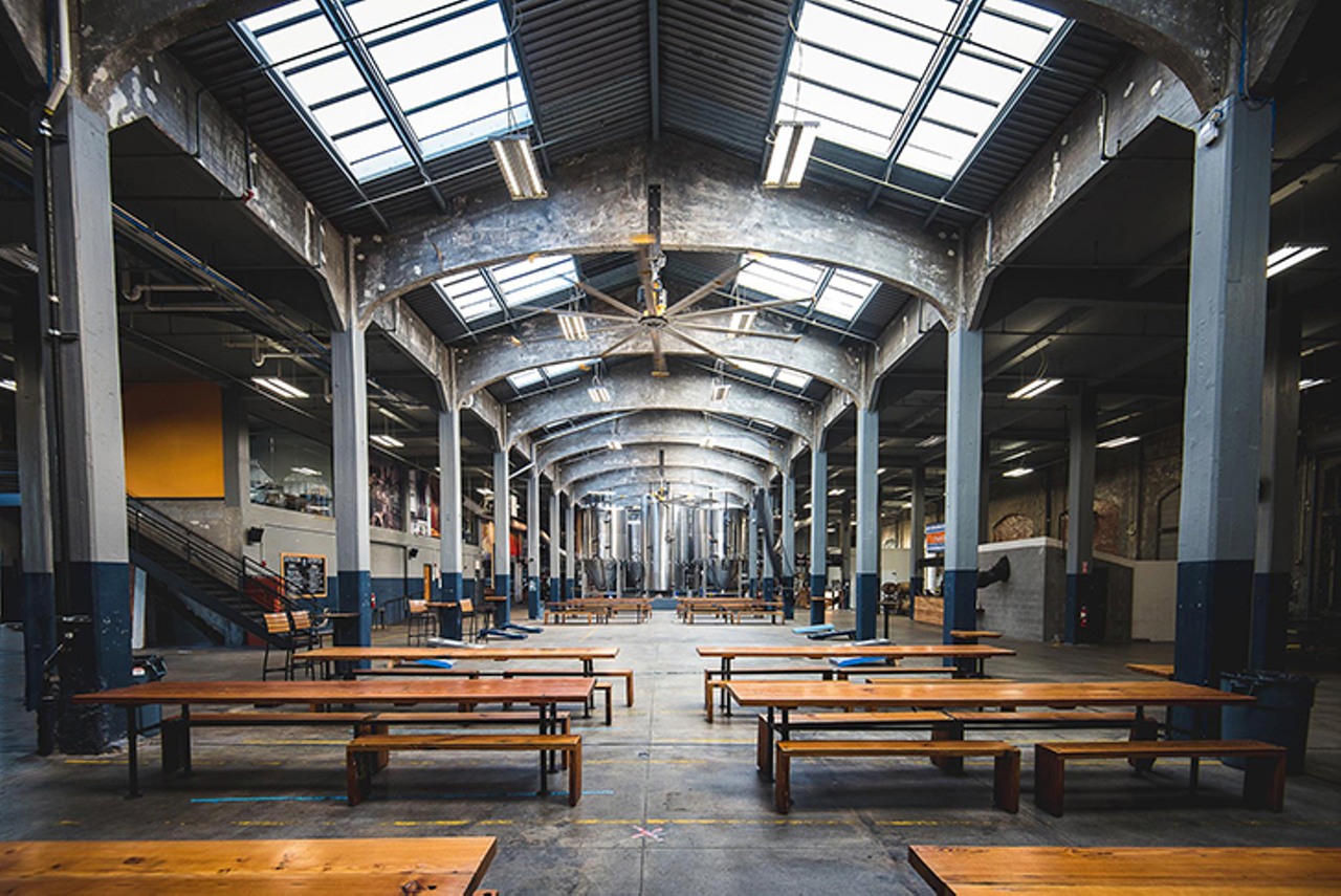 Rhinegeist Brewery
1910 Elm St., Over-the-Rhine
Rhinegeist, known for being one of Cincinnati's most popular craft breweries, has a massive taproom attached to their warehouse where they create their delicious brews. While the inside is cool, the true beauty of the space can be seen up on the rooftop bar where you can get a cold drink and see the city.