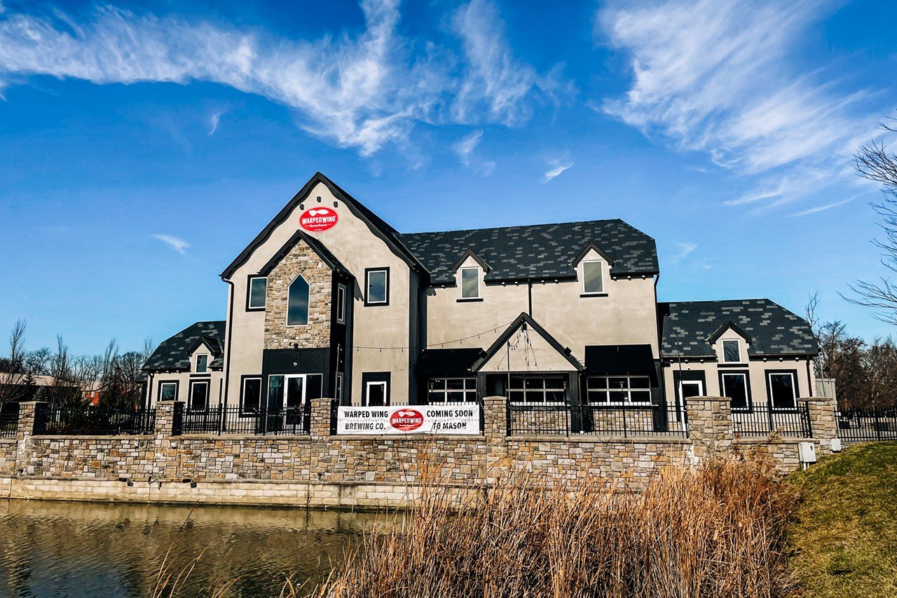 Warped Wing Brewing
5650 Tylersville Road, Mason
Dayton-based Warped Wing Brewing Company opened its Mason location in February of this year. The 13,000-square-foot location — in the former Brazenhead and Basil's on Market space — features a large taproom with many of Warped Wing's popular beers, like the Trotwood Lager, plus house-made hard seltzers. The food menu features smoked wings plus loads of sandwiches, tacos, platters and sharable options that feature house-smoked meats.