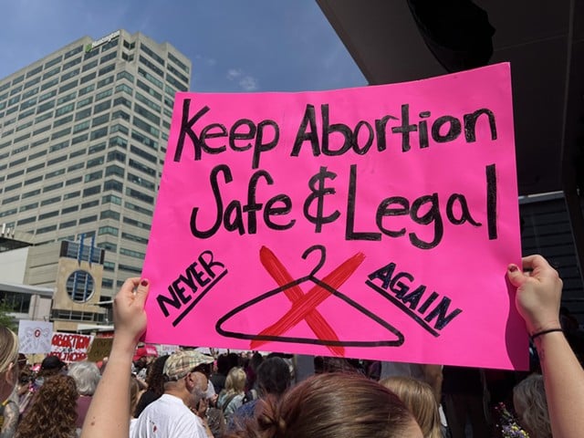 Demonstrators pack Fountain Square to rally support for abortion care access in Ohio.