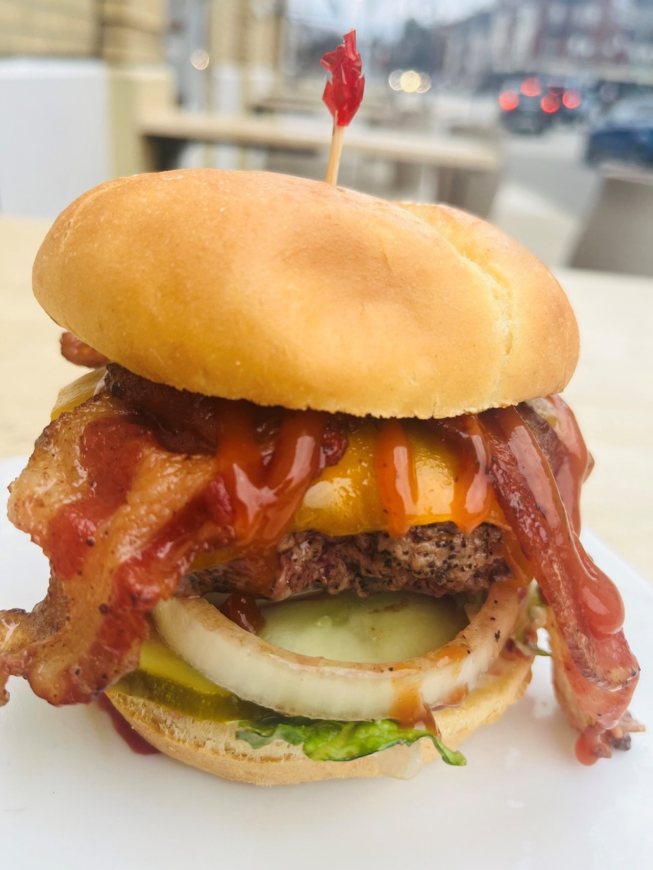 Oakley Pub & Grill
3924 Isabella Ave., Oakley
Memphis Burger: Premium angus chuck smothered with house BBQ sauce and topped with bacon and Wisconsin cheddar cheese, served with lettuce, onion, pickle and mayo.