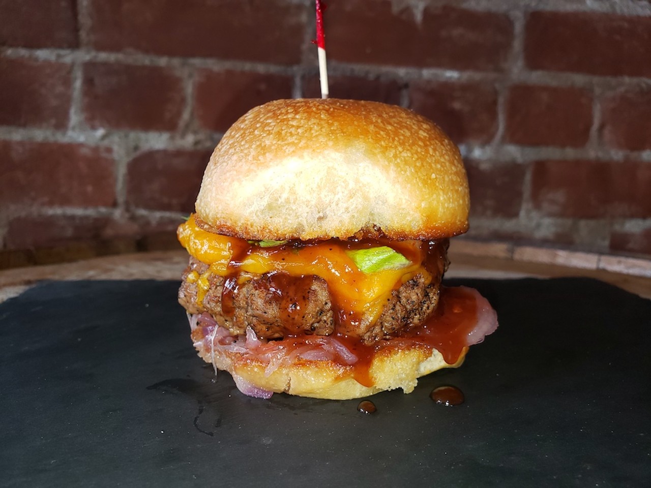 Pensive Distilling Company
720 Monmouth St., Newport
Strike the Gold: 6-oz. beef patty, topped with caramelized red onion, romaine lettuce, cheddar cheese and housemade bourbon BBQ sauce.