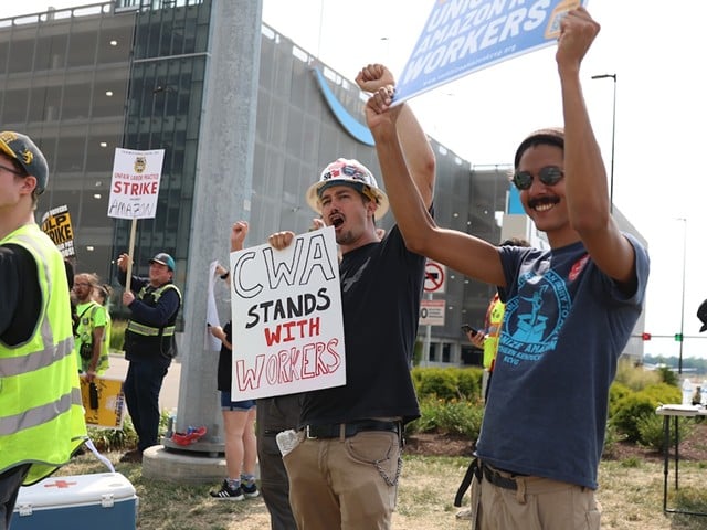 Amazon workers organizing with Teamsters at KCVG walked off the job on July 24.