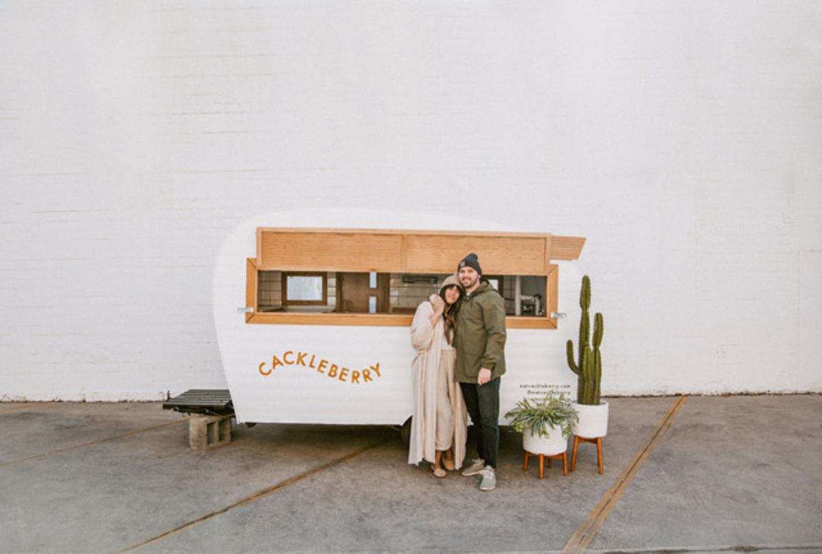 China (left) and Nate Kautz outside their Cackleberry food truck