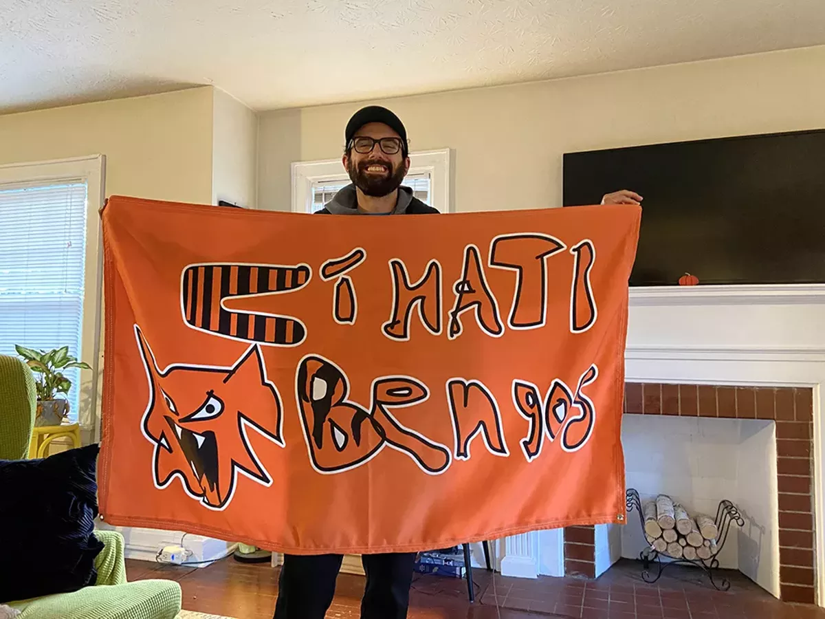 Kyle Gasnik with a Cinati Bengo flag
