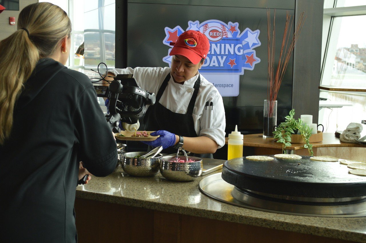 A chef prepares tacos at Great American Ball Park's The Handlebar.