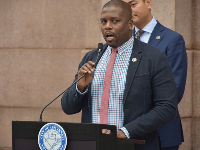 Cincinnati City Council Member Reggie Harris speaks before the city raises the transgender pride flag on March 31, 2022.