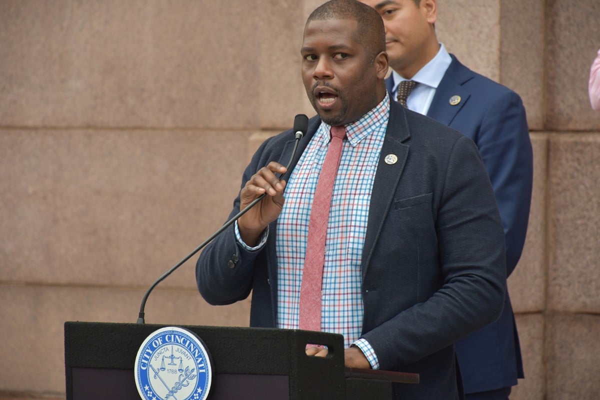 Cincinnati City Council Member Reggie Harris speaks before the city raises the transgender pride flag on March 31, 2022.