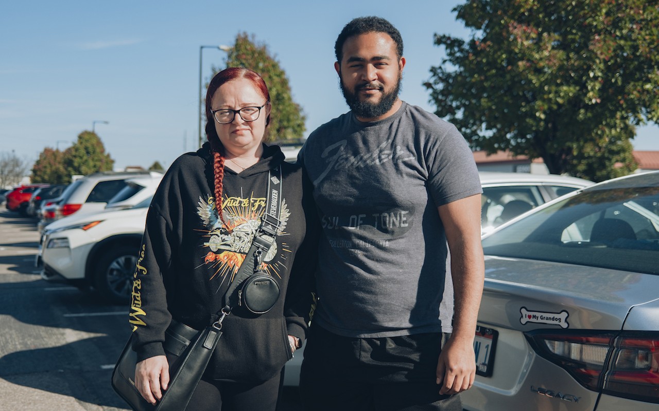 Anna and her son, Deashaun, stand outside the Hamilton County Board of Elections after voting "Yes" on Issues 1 and 2.