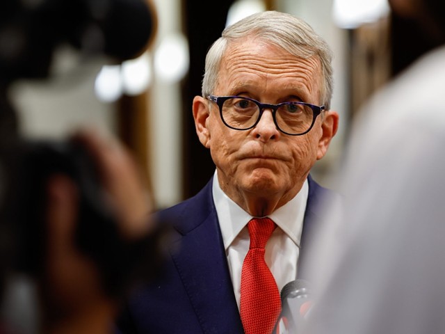 Ohio Governor Mike DeWine talks with the press.