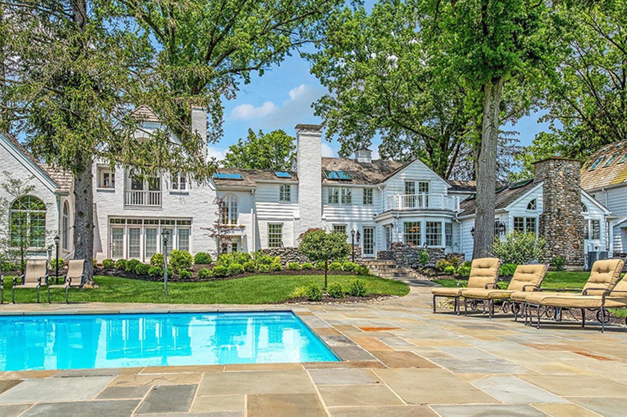 8195 Keller Road, Indian Hill
$2,699,999 | 7 bd/9 ba | 7,577 sq. ft. | Year Built: 1938
Nestled on over seven stunning acres in Indian Hill, this beautiful estate features an open floor plan, vaulted ceilings with farmhouse details and updates throughout. The land has both a spacious pool and a seven-stall horse barn.