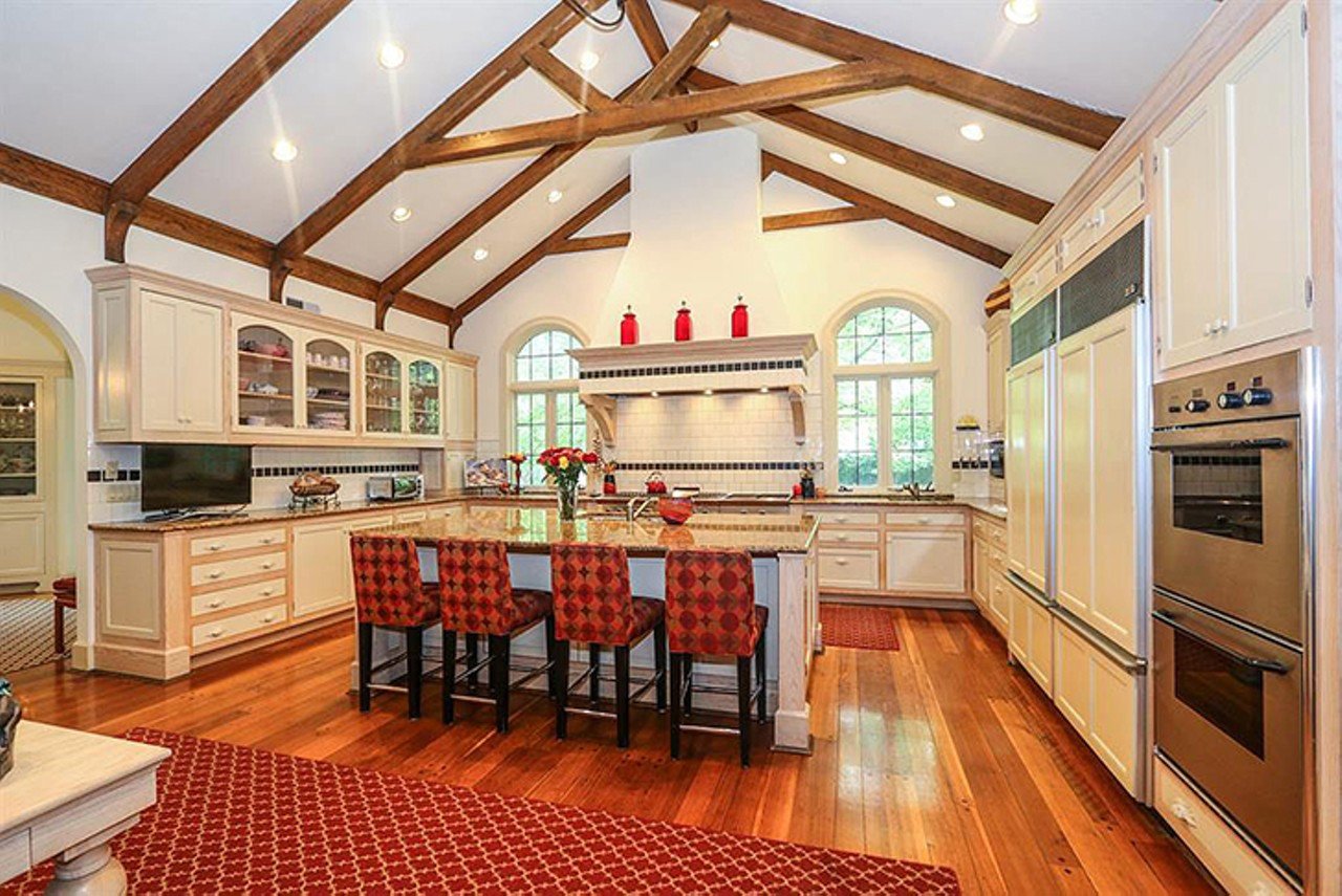 7325 Indian Hill Road, Indian Hill
$2,299,000 | 5 bd/8 ba | 9,496 sq. ft. | Year Built: 1923
This massive estate is situated on over five acres of land in Indian Hill. The home features arched doorways and beamed ceilings with unique details throughout the space. The park-like backyard offers a spacious, private pool, tennis court and breathtaking views.