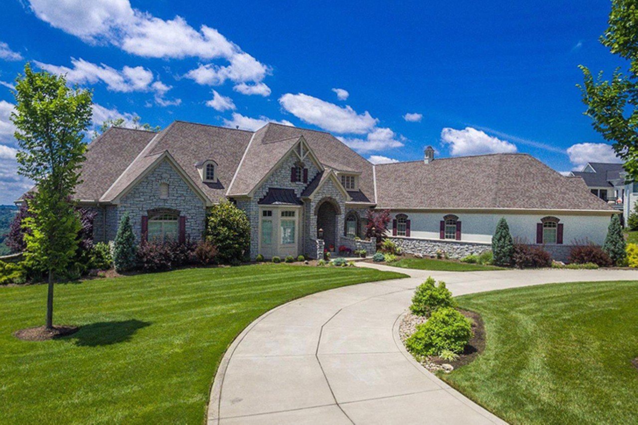 7935 Ayers Road, Anderson Township
$2,945,000 | 4 bd/ 7 ba | 7,855 sq. ft. | Year Built: 2014 
This enormous East Side ranch is situated on a scenic plot of land overlooking the Ohio River. With an open floor plan and large windows throughout the home, the light-filled space is perfect for entertaining.