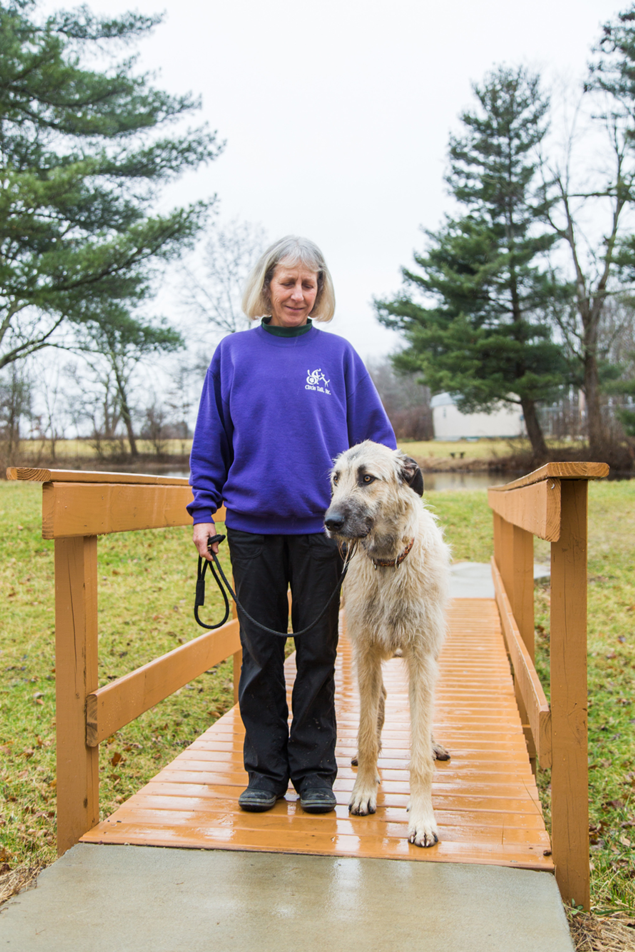 Circle Tail founder Marlys Staley with her Irish wolfhound Gage.