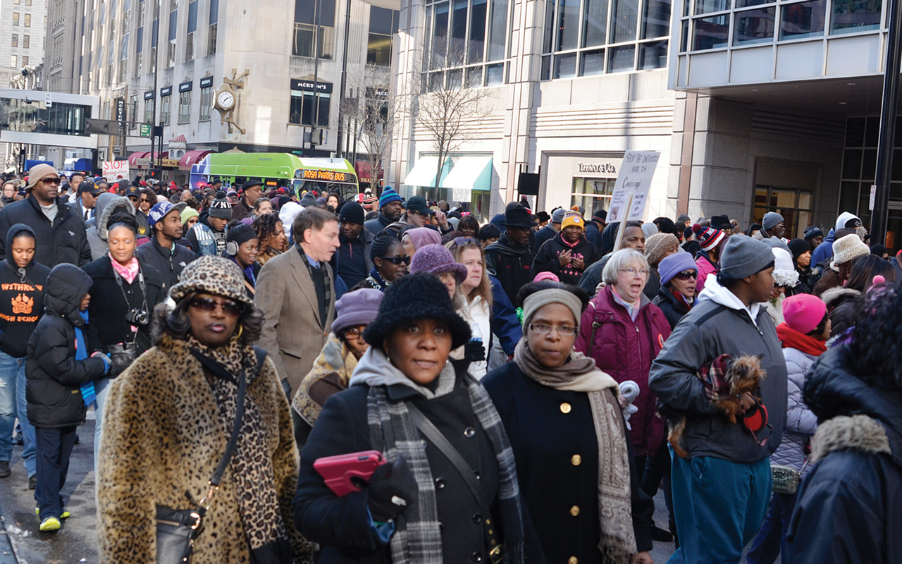 Anti-gentrification activists joined hundreds in Cincinnati’s Martin Luther King Jr. Day march downtown.