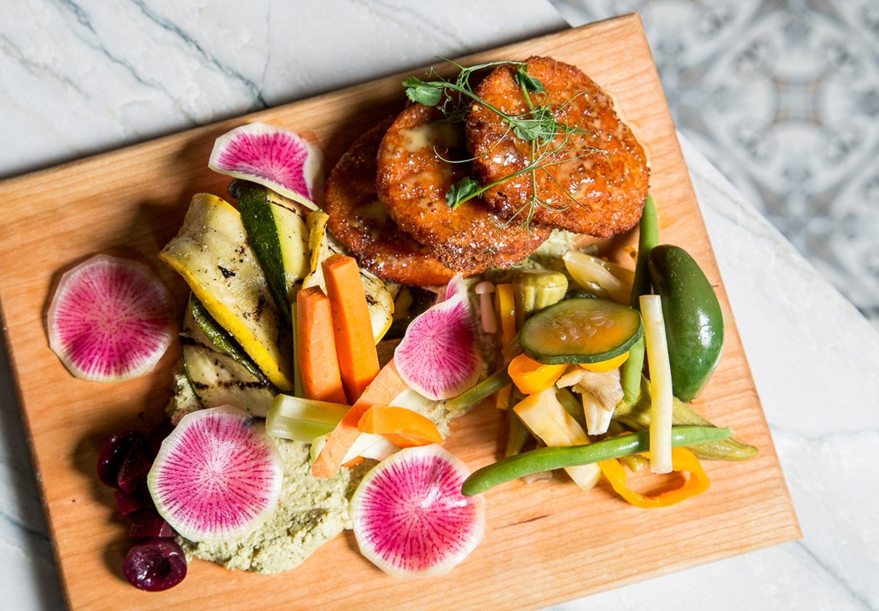 Louvinos vegetable board with pickles, edamame hummus, crudit&eacute;, fried green tomato and grilled squash