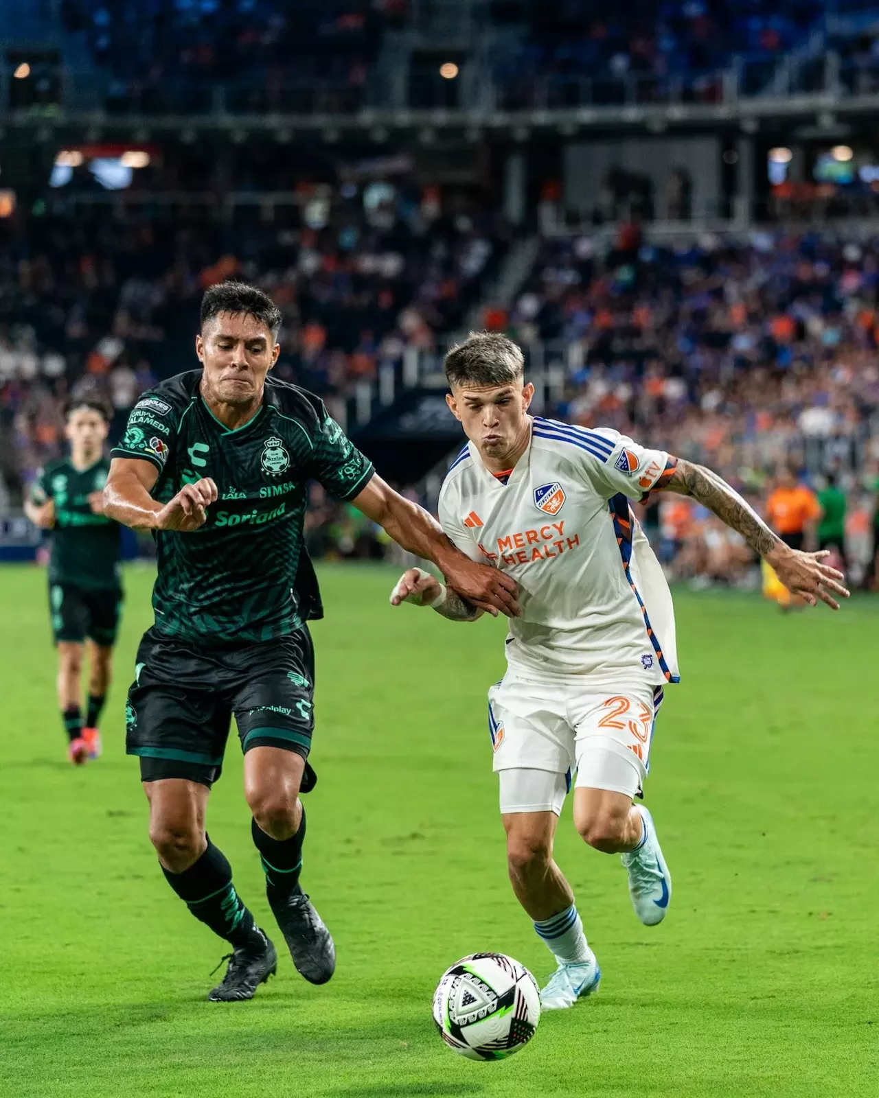 Luca Orellano races defender to loose ball | FC Cincinnati vs. Santos Laguna | Aug. 9, 2024