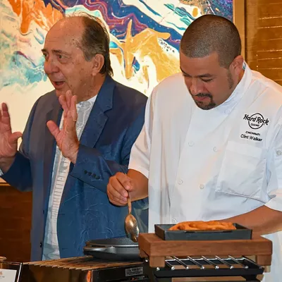 Cincinnati Reds legend Johnny Bench with Council Oak's new executive sous chef, Clint Walker