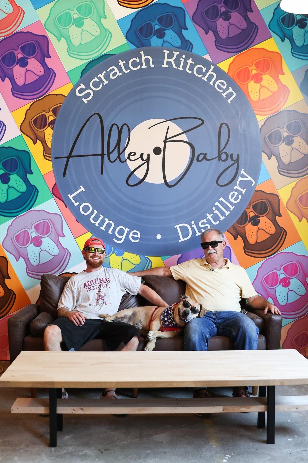 Owner of Alley Baby Alex Frohlich, his dog and his father all sit down together