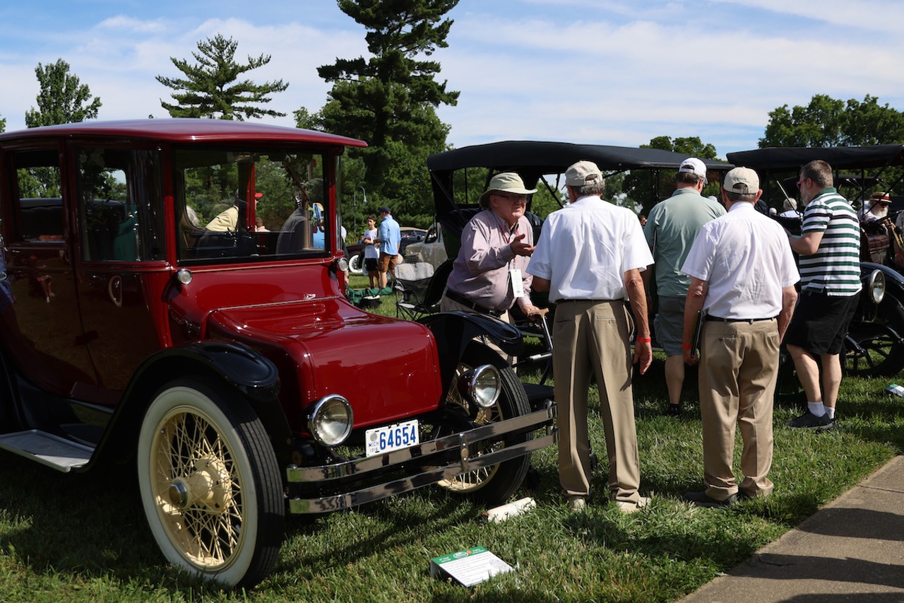 An exhibitor talks about his car to attendees at the 46th annual Cincinnati Concours d’Elegance car show on Sunday, June 9, 2024.