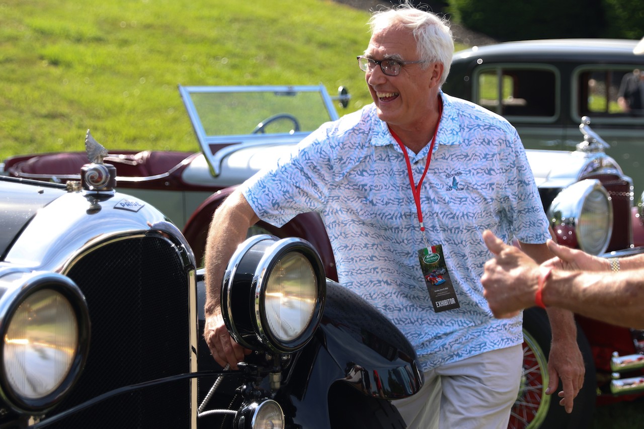 An exhibitor talks about his car to judges at the 46th annual Cincinnati Concours d’Elegance car show on Sunday, June 9, 2024.