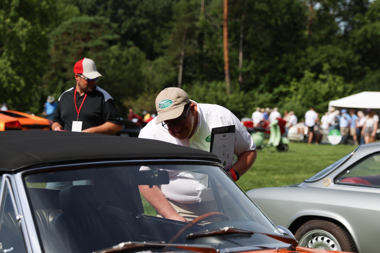 A judge inspects a car at the 46th annual Cincinnati Concours d’Elegance car show on Sunday, June 9, 2024.