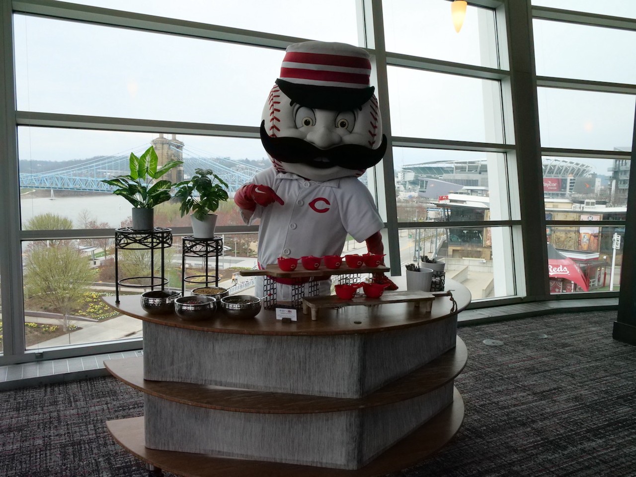 The Reds introduce new food options at Great American Ball Park on March 23, 2023, ahead of the Cincinnati Reds' 2023 season. Mr. Red dishes out fruit punch-flavored soft-serve ice cream in mini helmets.