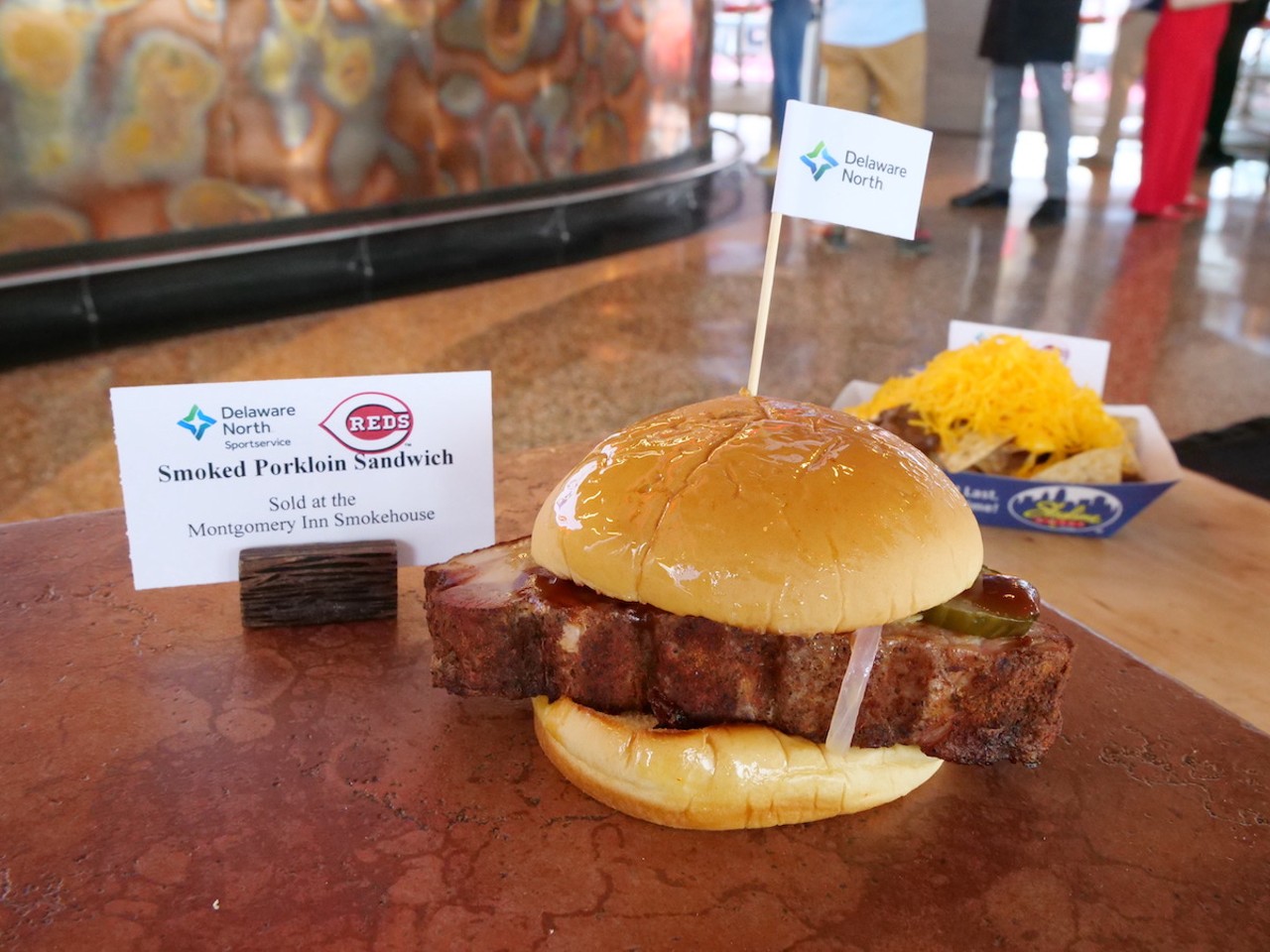 The Reds introduce new food options at Great American Ball Park on March 23, 2023, ahead of the Cincinnati Reds' 2023 season. A smoked pork loin sandwich is on the menu.