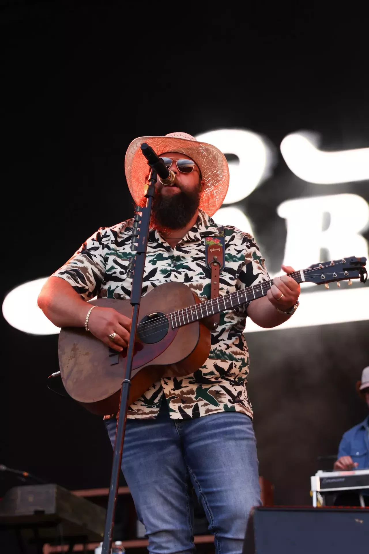 Larry Fleet performing during the Voices of America Country Music Festival on Aug. 8, 2024