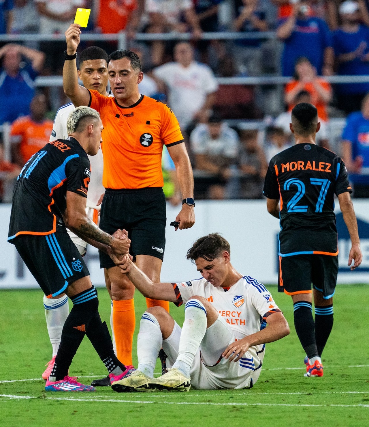 NYCFC player receives yellow card and helps Gerardo Valenzuela to his feet | FC Cincinnati vs. NYCFC | Aug. 5, 2024