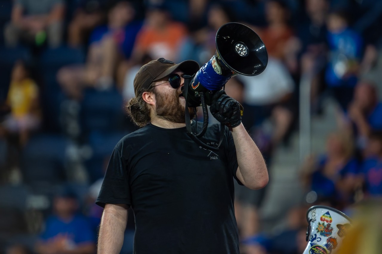 A fan leads a supporter's chant in The Bailey | FC Cincinnati vs. Chicago Fire | July 17, 2024