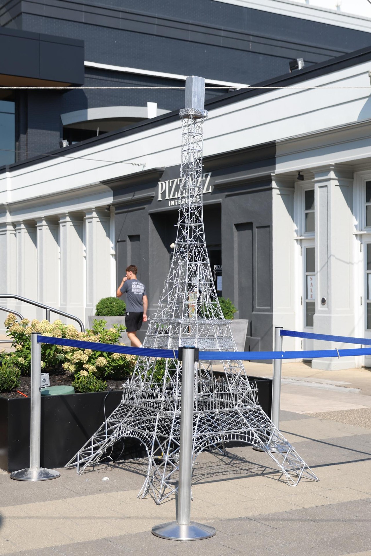 A replica of the Eiffel Tower at the Olympic Opening Ceremony celebration at Newport on the Levee on Friday, July 26, 2024.