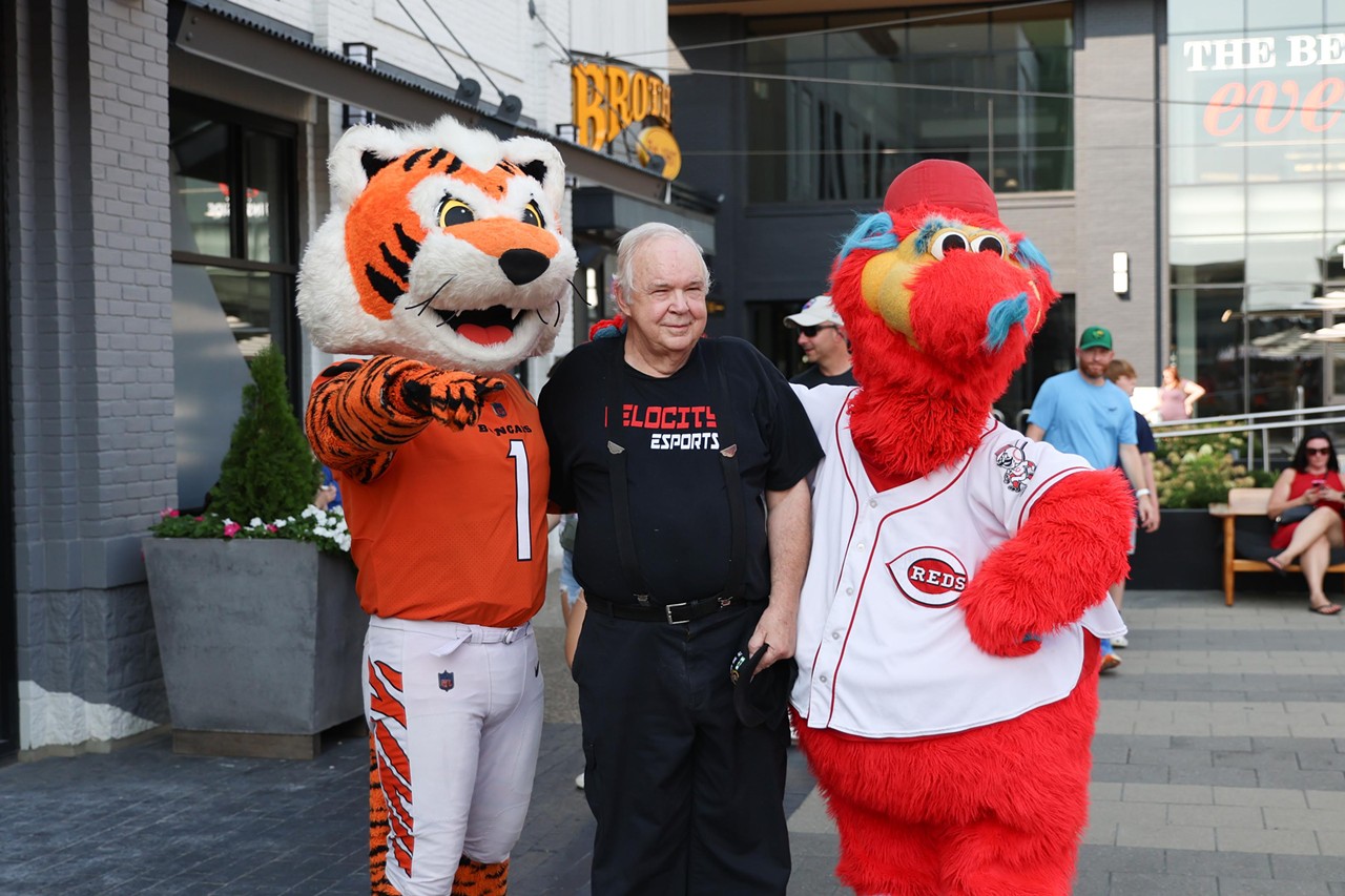 Gapper and Who Dey take a photo with a fan at the Olympic Opening Ceremony celebration at Newport on the Levee on Friday, July 26, 2024.