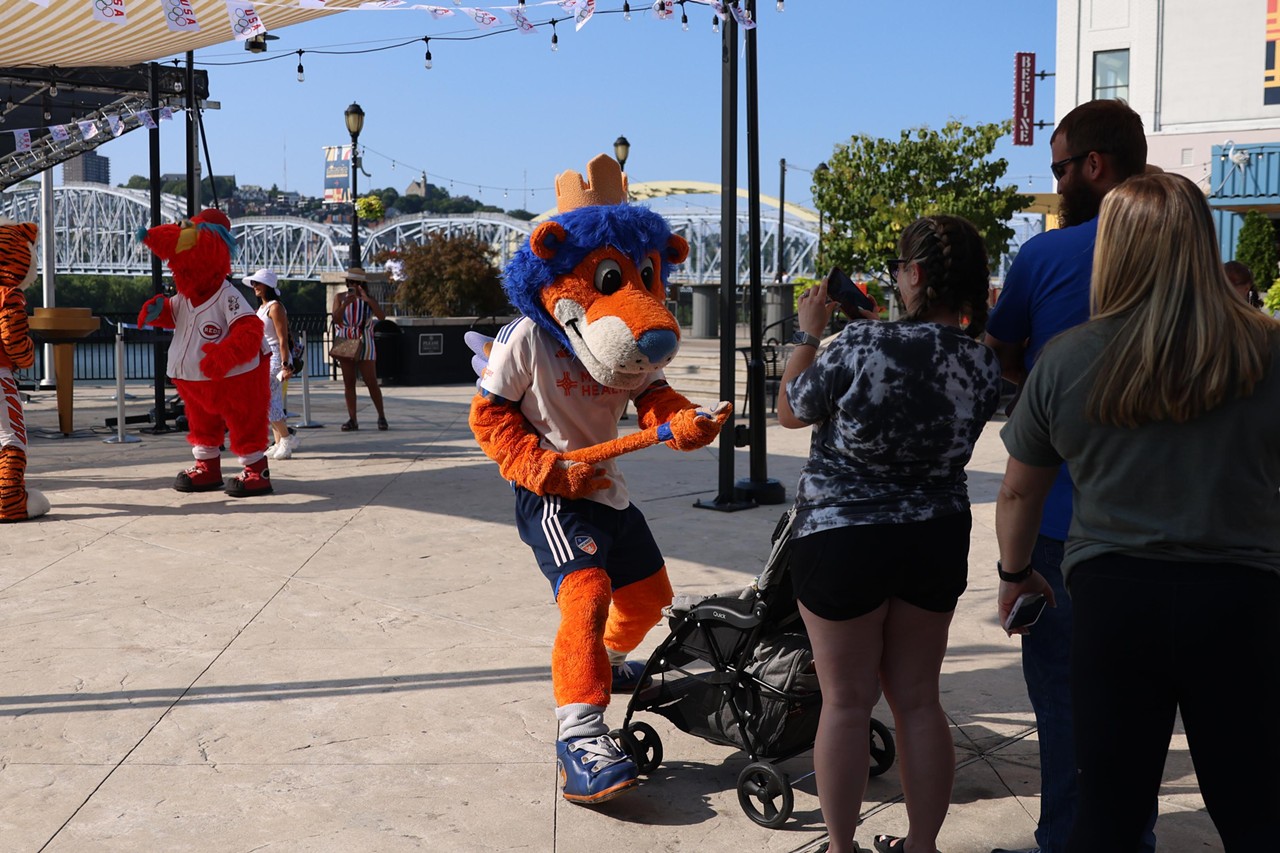 Gary the Lion dances at the Olympic Opening Ceremony celebration at Newport on the Levee on Friday, July 26, 2024.