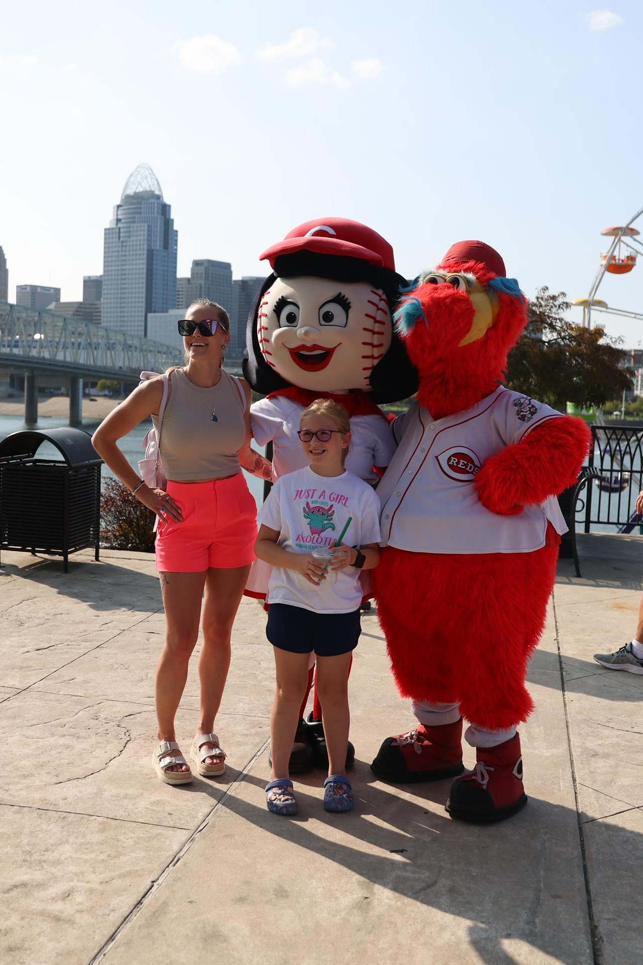 Rosie Red and Gapper take a photo with fans at the Olympic Opening Ceremony celebration at Newport on the Levee on Friday, July 26, 2024.