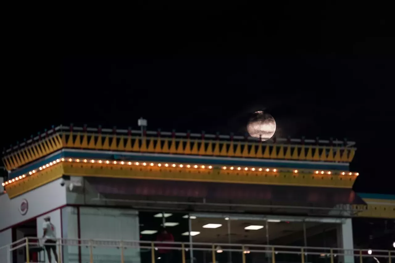 The moon peeks through the clouds behind Great American Ball Park | Cincinnati Reds vs. Kansas City Royals | Aug. 17, 2024