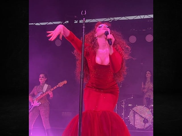 Chappell Roan floats on stage in drag, which everyone expected, but her persona was the surprise delight of the night. She was paying tribute to the late drag icon Divine — specifically her look from the John Waters cult classic Pink Flamingos.