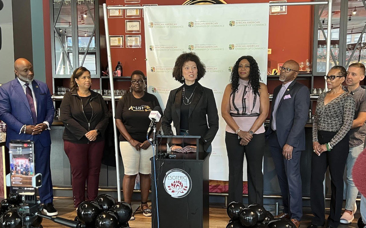 Briston Mitchell, director of transformative initiatives and relationships for the Greater Cincinnati and Northern Kentucky African American Chamber of Commerce, speaks during a press event  at Esoteric Brewing Company Sept. 19, 2022.