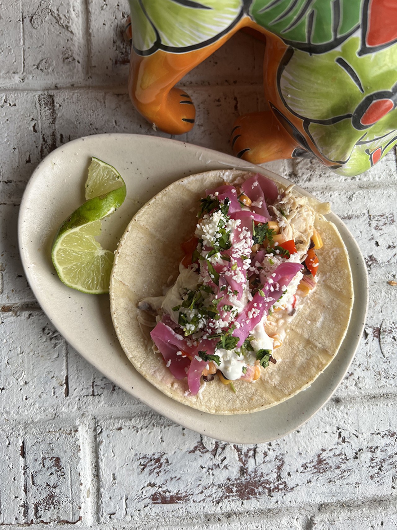 Mesa Loca
2645 Erie Ave., Hyde Park
Loco Pollo: Corn tortilla, Pulled Chicken, Lime Crema, Fiesta Mix (Corn Salsa), Purple Cabbage.