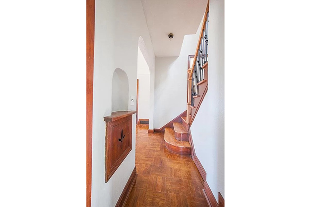 The Vintage Bathrooms in This College Hill Tudor Are a Pastel Dream