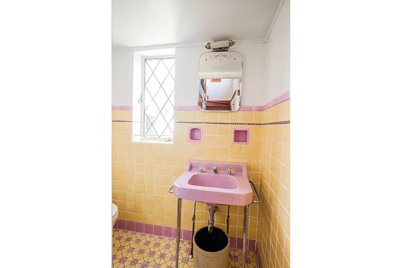 The Vintage Bathrooms in This College Hill Tudor Are a Pastel Dream