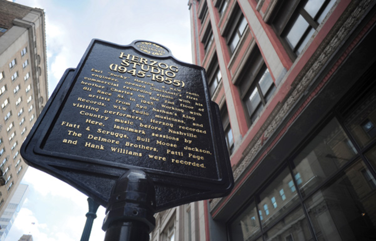 Herzog Studio/Hank Williams at Herzog
Where you can find the marker: Just outside CityBeat’s office at 811 Race St., Over-the-Rhine.
The history: Cincinnati’s first commercial recording studio, Herzog Studio, was opened on the second floor of CityBeat’s building in 1945 by brothers “Bucky," a WLW radio engineer, and Charles Herzog, making the Queen City the place to record country music before Nashville came calling. The studio worked with artists and musicians from WLW and King Records and stars like Hank Williams, Pattie Page and The Delmore Brothers. Herzog even cut Williams’ “Lovesick Blues,” the song that launched Williams to superstardom and earned him an invite to the Grand Ole Opry.