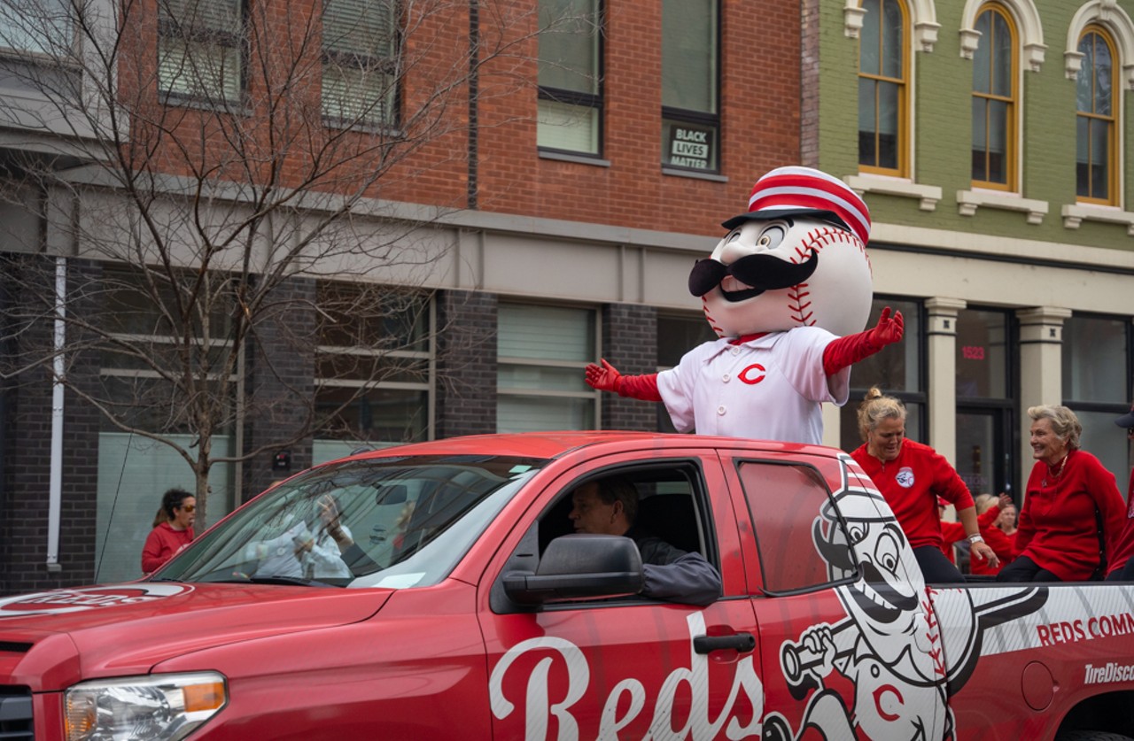 Findlay Market Opening Day Parade
Where you can find the marker: Outside Great American Ball Park at 100 Joe Nuxhall Way, Downtown.
The history: Nobody does Opening Day quite like Cincinnati, but to be fair, we’ve been doing our parade and celebrations to mark the beginning of the Cincinnati Reds’ season for over 100 years. The annual Findlay Market Opening Day Parade got its start in 1920 after the Reds won the World Championship the year before. Fans gathered at Findlay Market for the first parade, and the rest is history. It became an annual tradition featuring marching bands, horse-drawn wagons and fans, or “rooters,” as they were called. While the tradition might have changed a little bit over the last century, the enthusiasm for the parade remains as strong as ever.