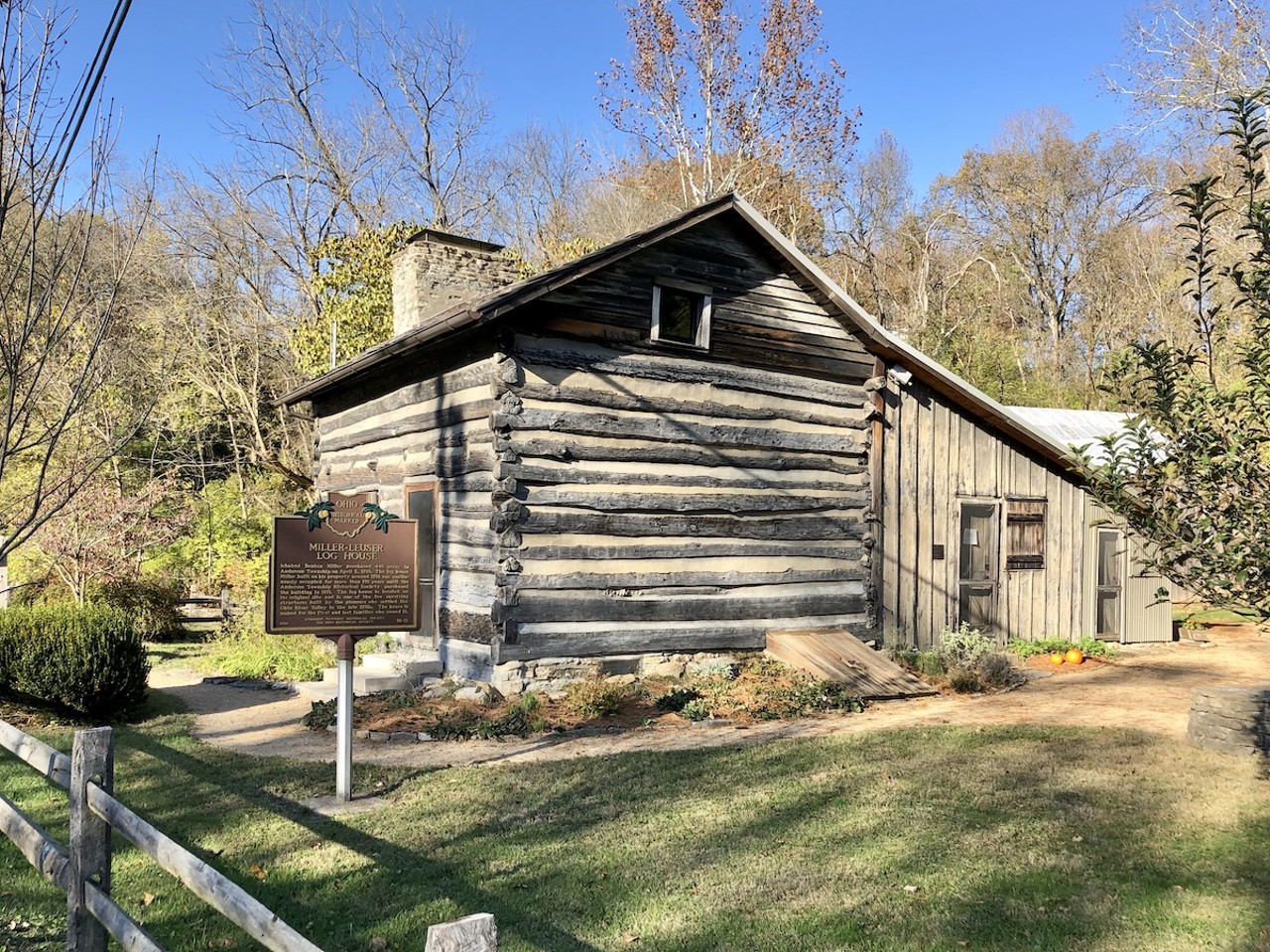 Miller-Leuser Log House
Where you can find the marker: Near 6540 Clough Pike, Anderson Township.
The history: This log house, named after the first and last families to own it, in Anderson Township is one of the only surviving structures built by Ohio River Valley settlers, and it’s on the same site where it was built. Ichabod Benton Miller built the home around 1796 and it remained occupied for the next 170 years. Anderson Township bought the house in 1971.